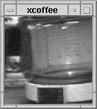 Grainy black and white webcam image of the Trojan Room coffee pot
